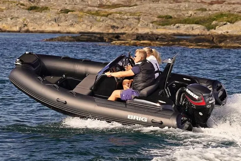 Slide: The Image of Manufacturer Provided Image: 2026 Brig Eagle 4 inflatable boat cruising on water with two passengers. - 3