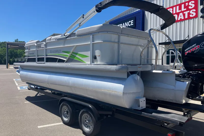Slide: The Image of 2023 Godfrey Sweetwater 2286 BF pontoon boat on trailer, parked outside dealership. - 16