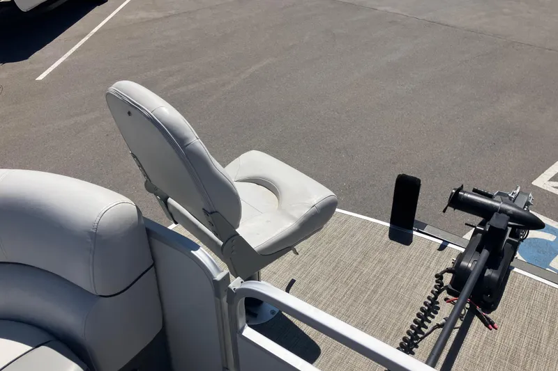 Slide: The Image of 2023 Godfrey Sweetwater 2286 BF boat with comfortable seating and fishing equipment. - 12