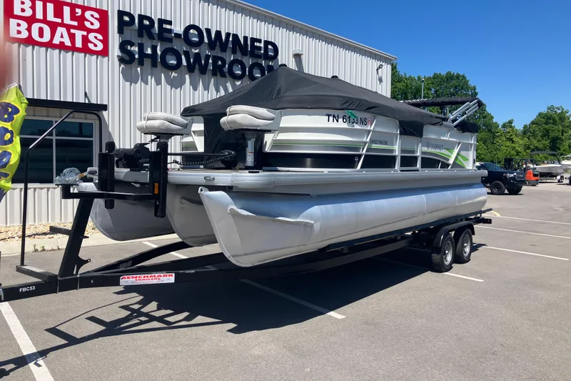 Slide: The Image of 2023 Godfrey Sweetwater 2286 BF pontoon boat at Bill's Boats pre-owned showroom. - 2