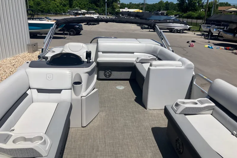 Slide: The Image of 2023 Godfrey Sweetwater 2286 BF pontoon boat with spacious seating and modern design. - 11