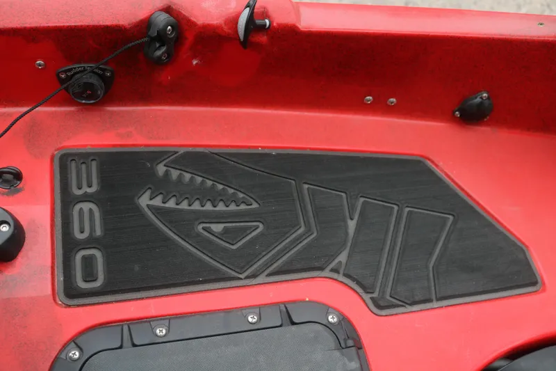 Slide: The Image of Red 2023 Hobie Mirage Pro Angler 14 kayak with black non-slip deck pad. - 10