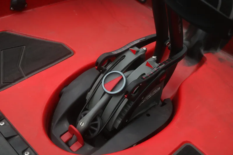 Slide: The Image of Close-up of 2023 Hobie Mirage Pro Angler 14 pedal drive system in red kayak. - 9