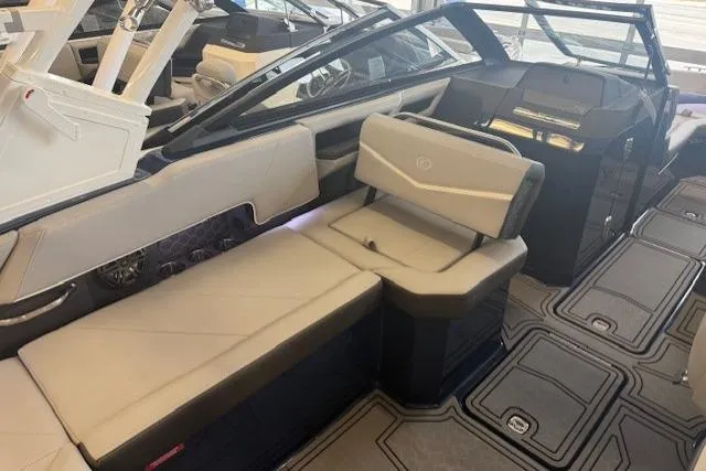 Slide: The Image of 2026 Cobalt R6 Surf boat interior with luxurious seating and modern design. - 11