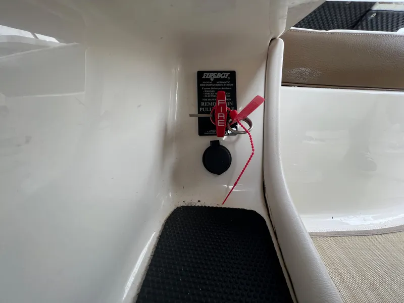 Slide: The Image of Close-up of a boat switch with safety lanyard and socket. - 35
