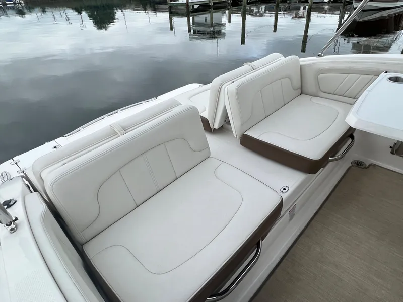 Slide: The Image of The image shows the cockpit of a 2016 Chaparral 257 SSX with white seating. - 30
