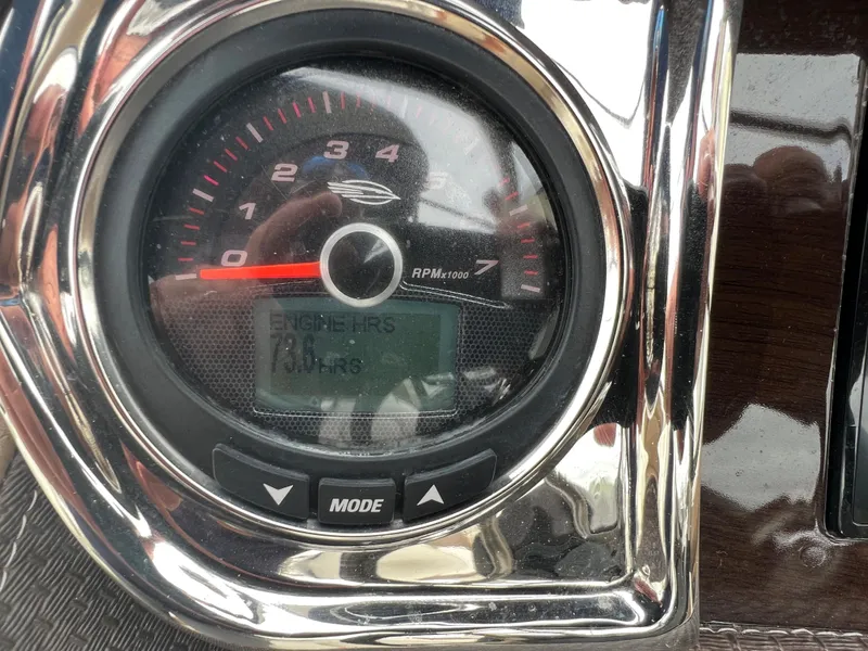 Slide: The Image of Close-up of a tachometer with digital display on a boat. - 45