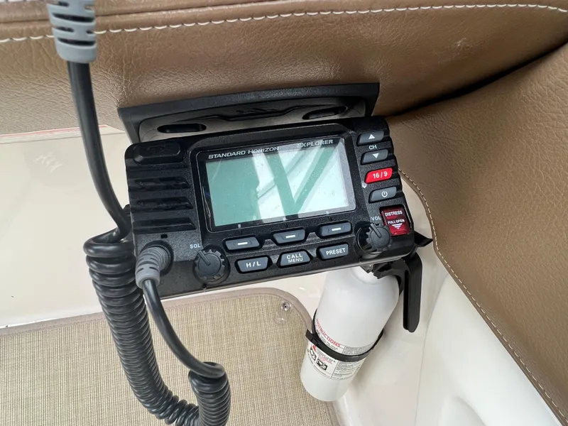 Slide: The Image of Radio and fire extinguisher in a boat. - 44
