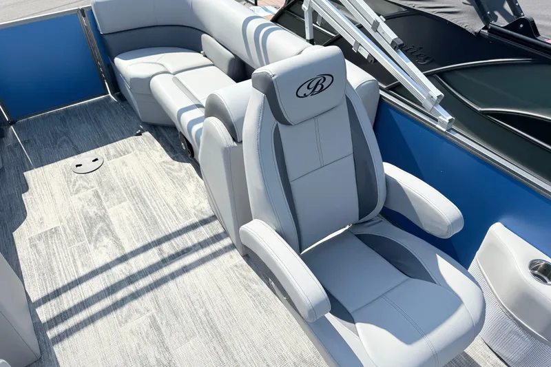 Slide: The Image of 2027 Bentley Pontoons Legacy 240 Navigator interior with luxurious seating and modern design. - 4