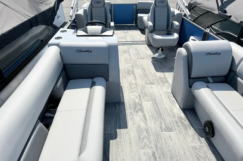 Slide: The Image of 2027 Bentley Pontoons Legacy 240 Navigator interior with luxurious seating and modern design. - 7