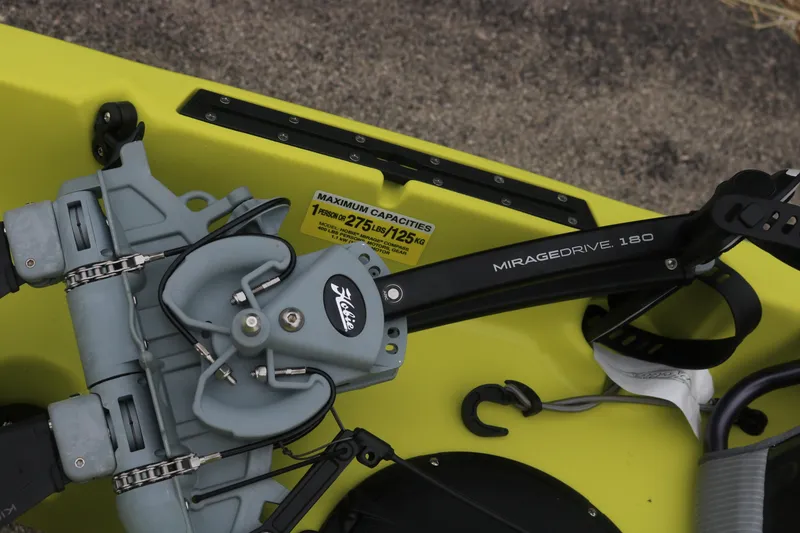 Slide: The Image of 2025 Hobie Mirage Compass kayak with MirageDrive 180 pedal system, yellow hull, capacity label visible. - 3