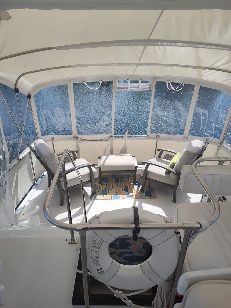 Slide: The Image of The image shows the cockpit of a 1989 Chris-Craft 372 Catalina with seating and a life ring. - 40