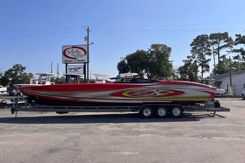 The Image of 2007 Outerlimits 39 GTX powerboat on trailer at Marker 17 Marine dealership. - 1