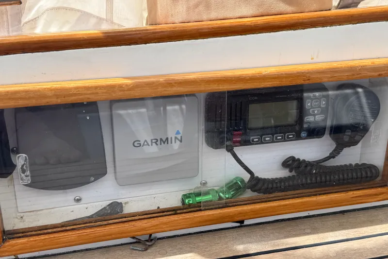 Slide: The Image of Control panel with Garmin and Icom devices on a 1989 Mason 54 yacht. - 42