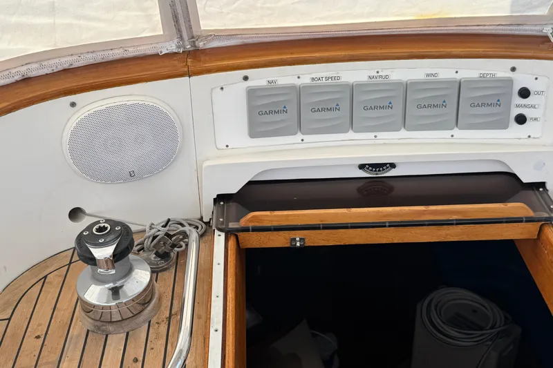 Slide: The Image of Cockpit of 1989 Mason 54 yacht with Garmin navigation instruments and winch. - 40