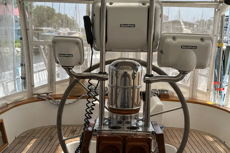 Slide: The Image of Steering wheel and NavPod equipment on a 1989 Mason 54 yacht. - 38