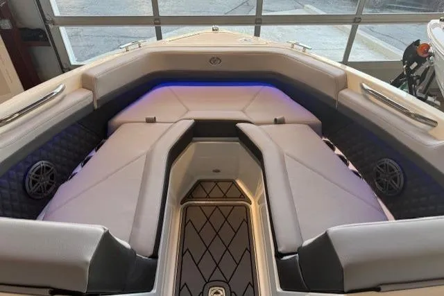 Slide: The Image of Interior of 2026 Cobalt R4 boat with modern seating and ambient lighting. - 6