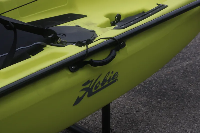 Slide: The Image of 2025 Hobie Mirage Passport 12.0 R kayak in vibrant yellow, close-up view. - 4