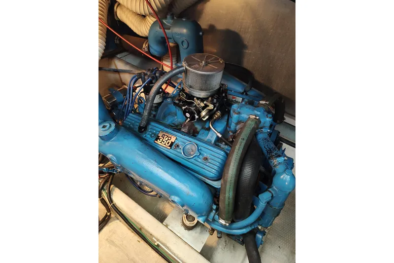 Slide: The Image of 1989 Chris-Craft 372 Catalina engine, blue, detailed view of components and hoses. - 27
