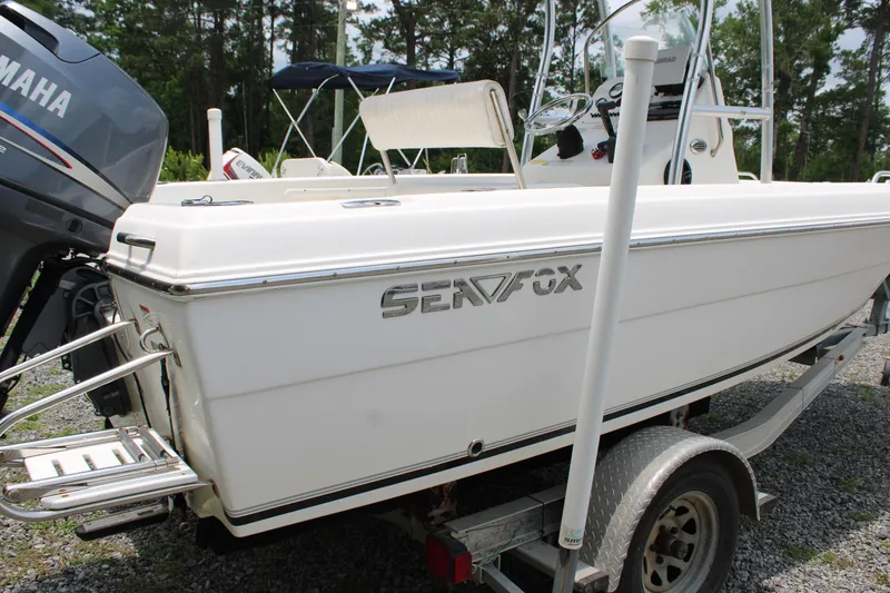 Slide: The Image of 2012 Sea Fox 187 Center Console boat on trailer, featuring Yamaha engine. - 11