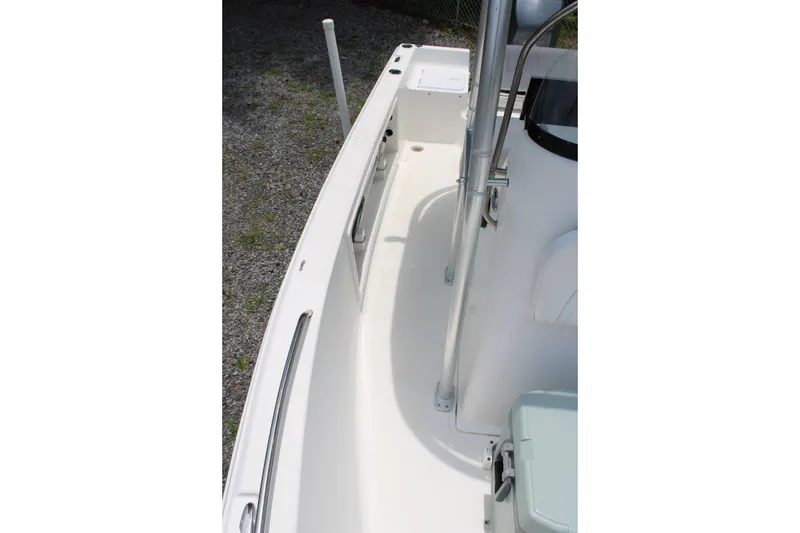 Slide: The Image of 2012 Sea Fox 187 Center Console boat interior with clean deck and railing. - 15
