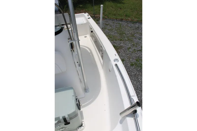 Slide: The Image of 2012 Sea Fox 187 Center Console boat deck with stainless steel railing and rod holder. - 14