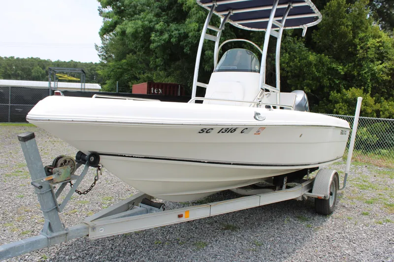 Slide: The Image of 2012 Sea Fox 187 Center Console boat on trailer, parked outdoors. - 4