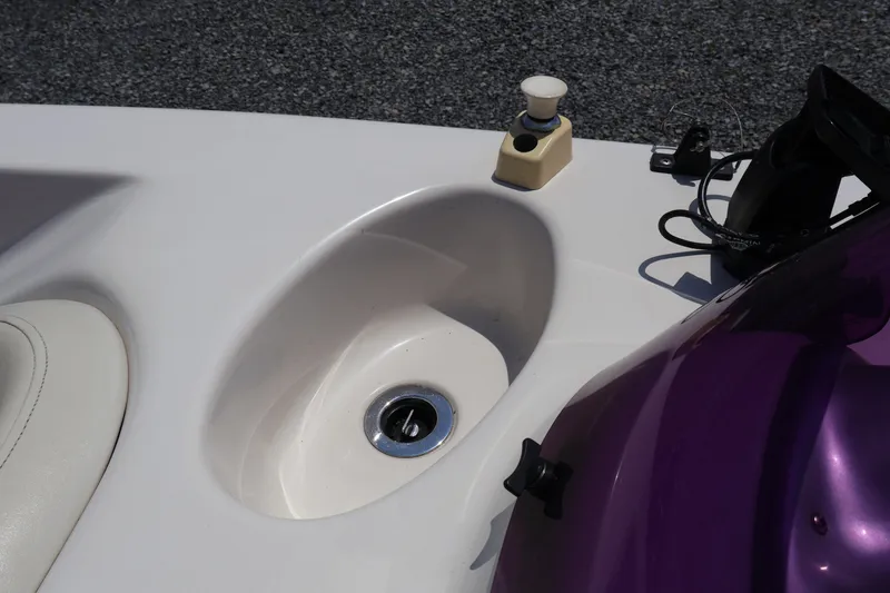 Slide: The Image of 2008 Starcraft 2000 IO Limited boat interior detail with ignition key slot. - 38
