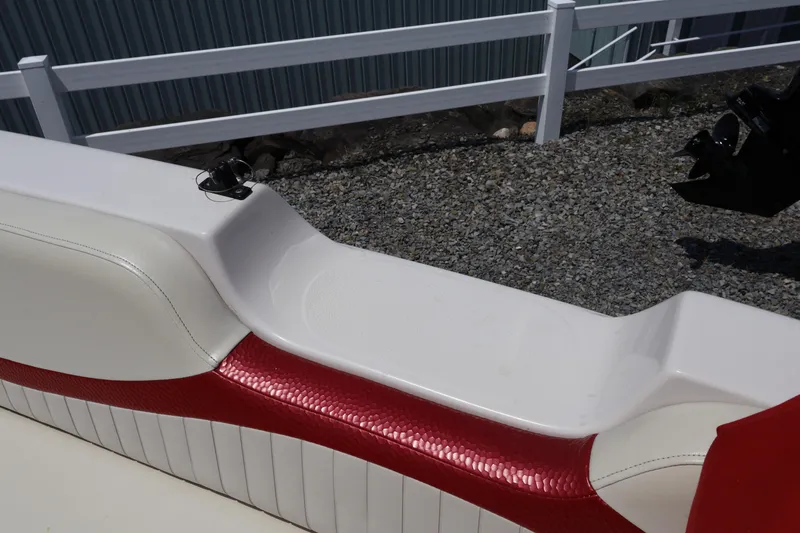 Slide: The Image of 2008 Starcraft 2000 IO Limited boat interior with red and white seating detail. - 37