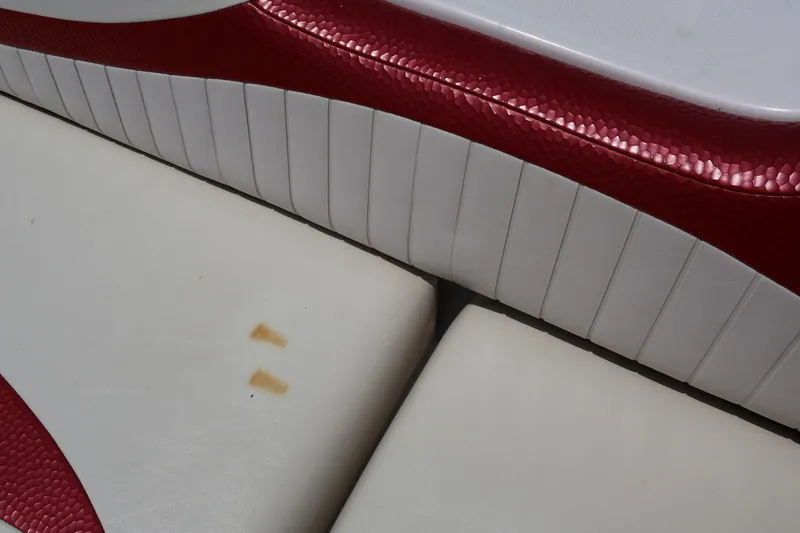 Slide: The Image of White and red upholstery on a 2008 Starcraft 2000 IO Limited boat seat. - 36