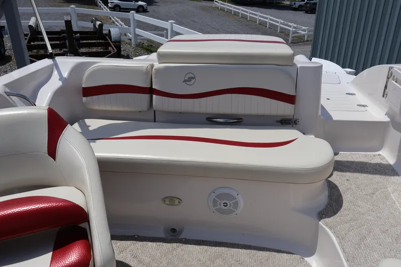 Slide: The Image of 2008 Starcraft 2000 IO Limited boat interior with red and white seating. - 14