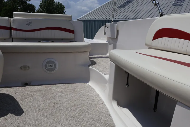 Slide: The Image of Interior of 2008 Starcraft 2000 IO Limited boat with white and red seating. - 35