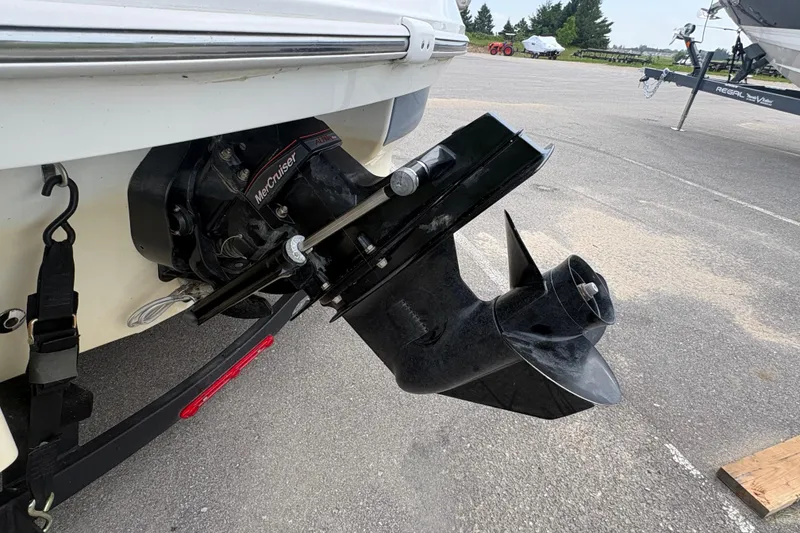 Slide: The Image of Rear view of a 2018 Tahoe 500 TF boat with MerCruiser outdrive. - 3
