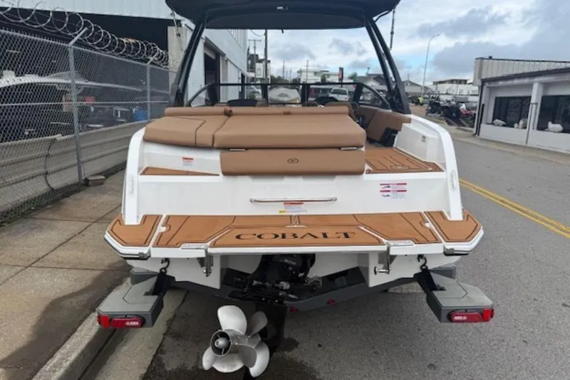 Slide: The Image of 2026 Cobalt CS22 boat rear view, showcasing sleek design and modern features. - 2