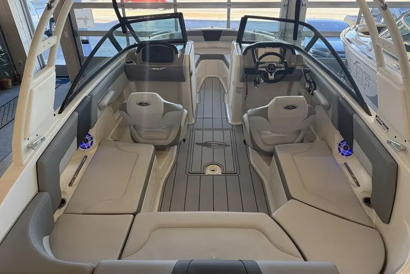 Slide: The Image of 2026 Chaparral 23 SSi boat interior with modern seating and sleek design. - 11
