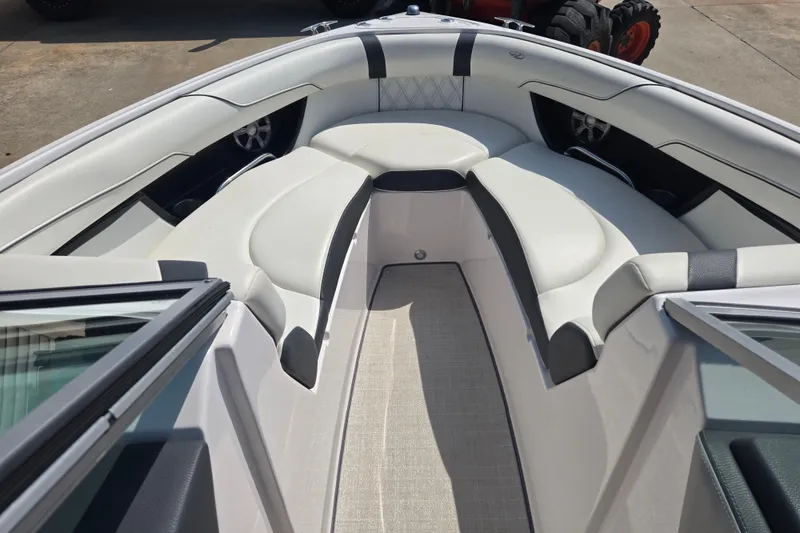 Slide: The Image of 2020 Regal 2300 Bowrider boat interior with plush seating and modern design. - 14