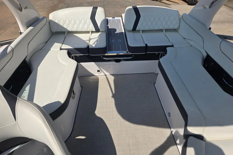 Slide: The Image of 2020 Regal 2300 Bowrider interior with spacious seating and elegant upholstery design. - 12