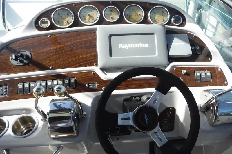 Slide: The Image of Control panel of a 2005 Chaparral Signature 350 boat with Raymarine navigation system. - 8