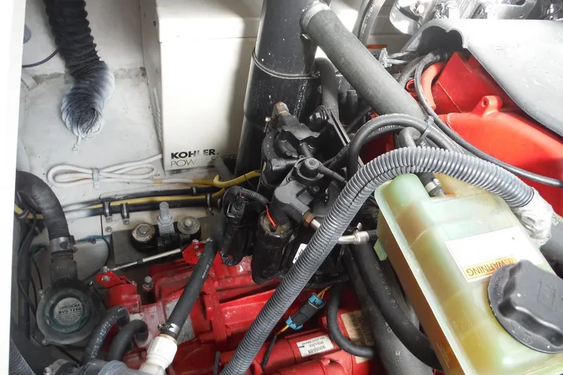 Slide: The Image of Engine compartment of 2005 Chaparral Signature 350 with Kohler power system visible. - 34