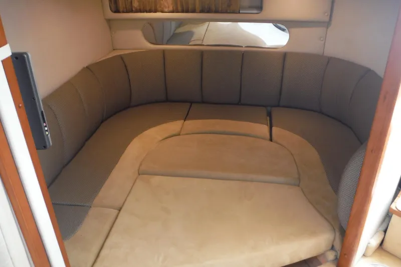 Slide: The Image of Interior cabin of 2005 Chaparral Signature 350 boat with cozy seating arrangement. - 20
