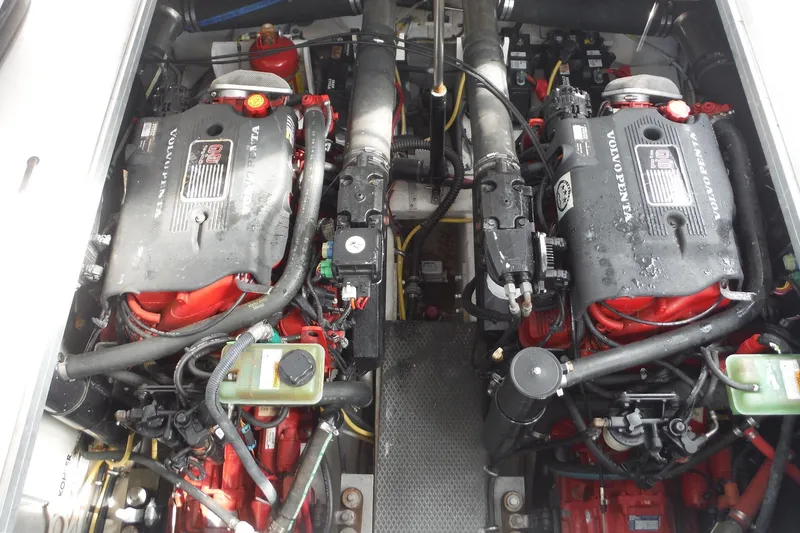 Slide: The Image of Engine compartment of a 2005 Chaparral Signature 350 boat with dual Volvo Penta engines. - 33