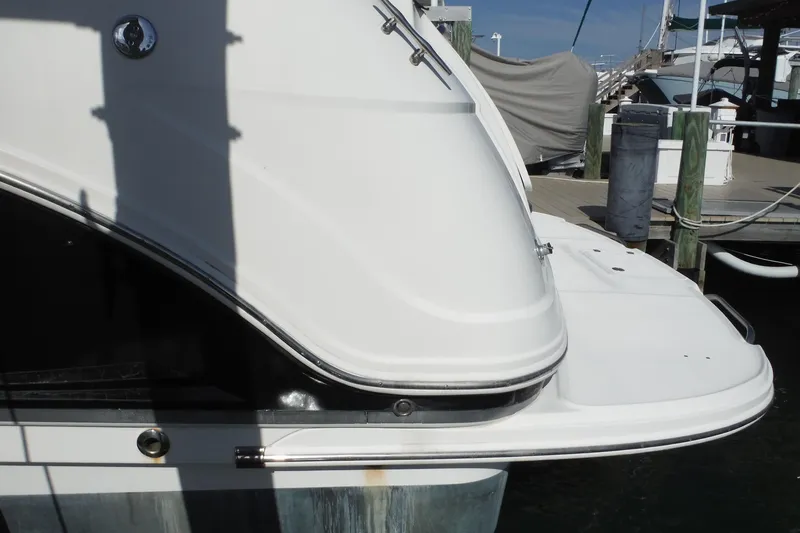 Slide: The Image of 2005 Chaparral Signature 350 yacht docked at marina, rear view. - 2