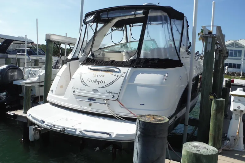 Slide: The Image of Chaparral Signature 350 boat from 2005 docked at a marina. - 4