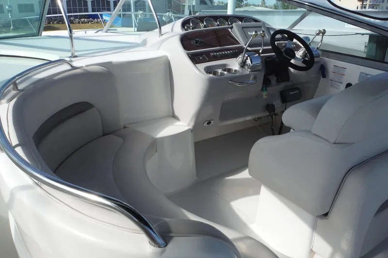 Slide: The Image of 2005 Chaparral Signature 350 boat interior with sleek helm and comfortable seating. - 7