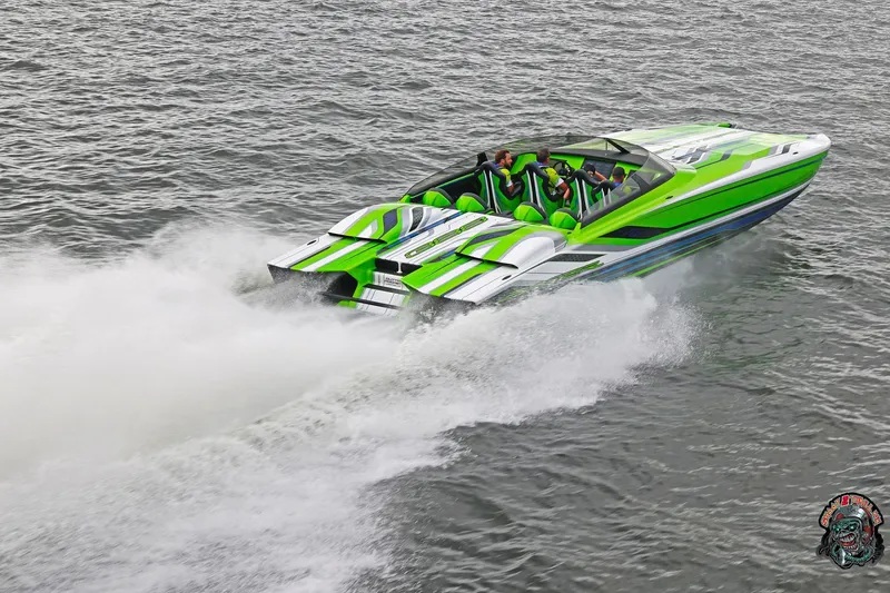 Slide: The Image of High-speed Skater 388 powerboat, 2025 model, in vibrant green and white, cruising on water. - 22