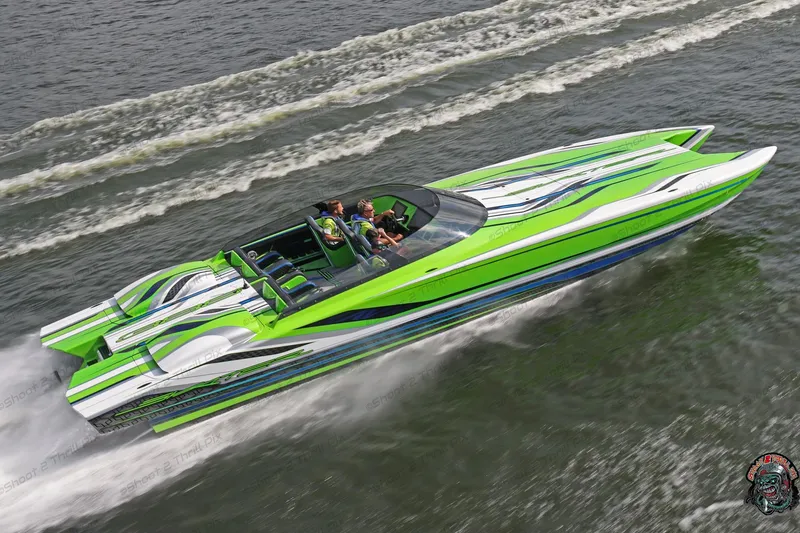 Slide: The Image of High-speed Skater 388 powerboat, 2025 model, with vibrant green and white design on water. - 4