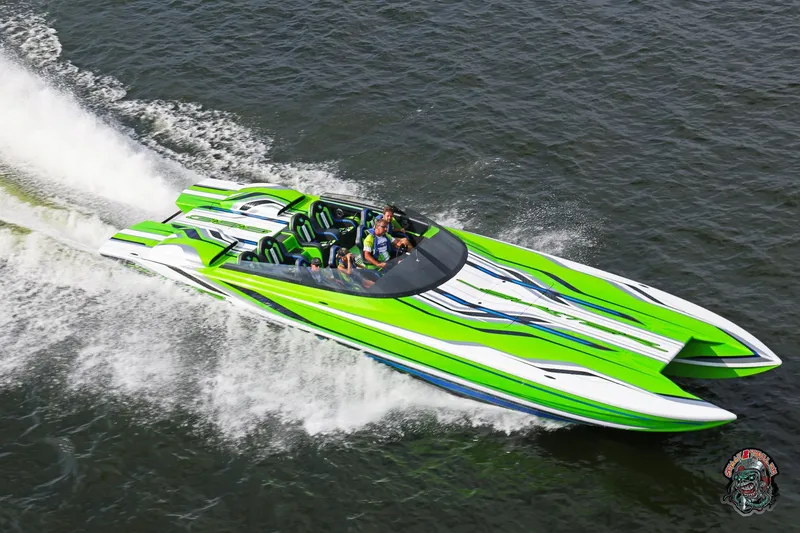 Slide: The Image of High-speed Skater 388 powerboat, 2025 model, with vibrant green and white design on water. - 29