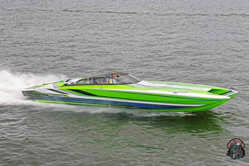 Slide: The Image of 2025 Skater 388 speedboat in vibrant green, cruising swiftly on open water. - 31