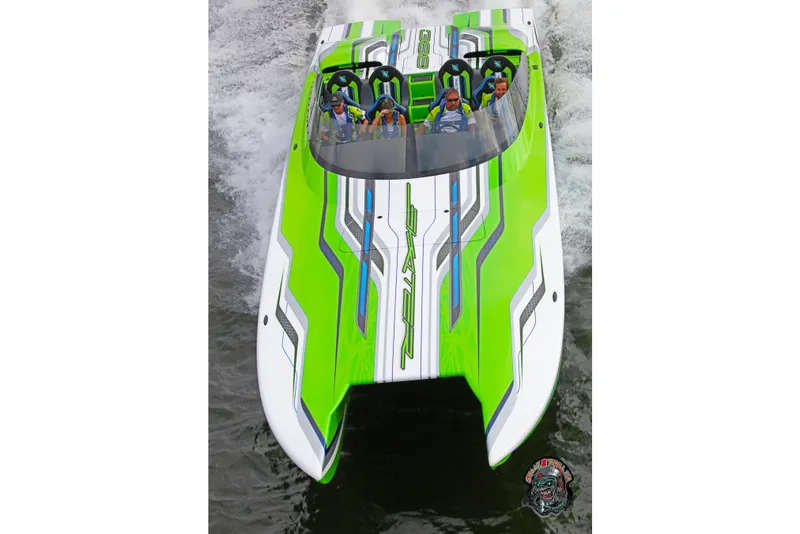 The Image of 2025 Skater 388 speedboat with vibrant green and white design on water. - 10
