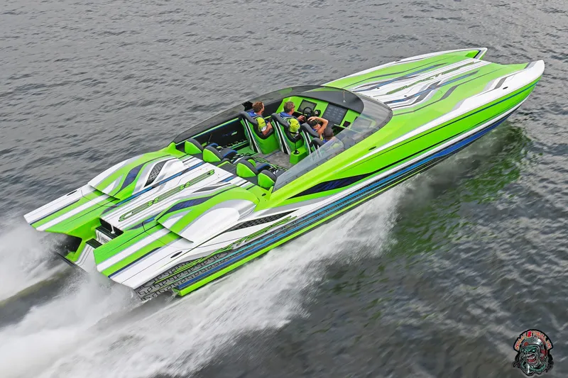Slide: The Image of High-speed Skater 388 powerboat, 2025 model, with vibrant green and white design on water. - 2